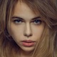 Cara de Alexandra Smelova